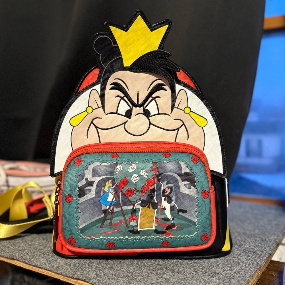 Alice in Wonderland LOUNGEFLY backpack. Gently used
